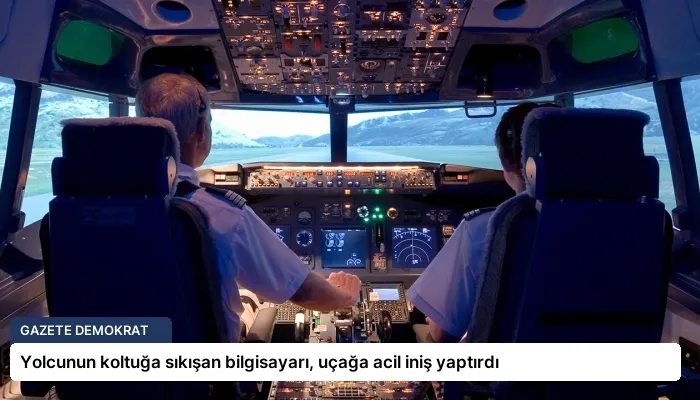 Yolcunun koltuğa sıkışan bilgisayarı, uçağa acil iniş yaptırdı
